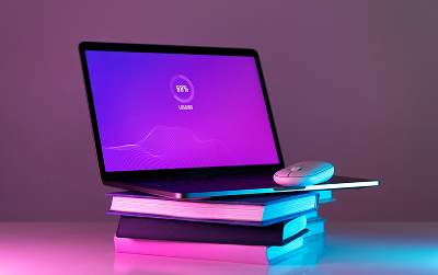 Laptop showing website designs